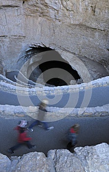 People walking down the natural entrance, Carlsbad Caverns National Park, New Mexico, United States of America