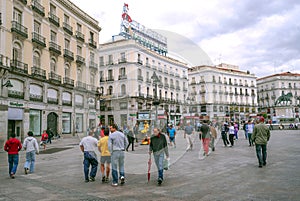 People walking down a shopping street