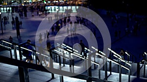 People walking downstairs, leaving stadium after football match, sporting event