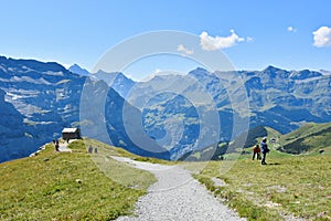 People walking at Eigergletscher railway station