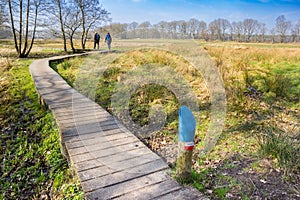 People walking the famous dutch Pieterpad walking path near Oudemolen