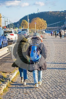 People walking a long road in Budapest