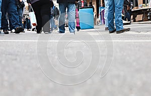 People walking outside in a busy city from a low angle with copy space for text