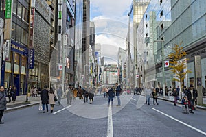 People walking and relaxing on Ginza street in Tokyo, Japan