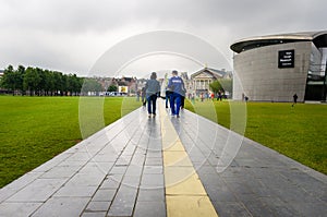 People Walking on a Stone Path