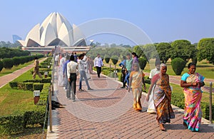 People walking to and from Lotus temple in New Delhi, India