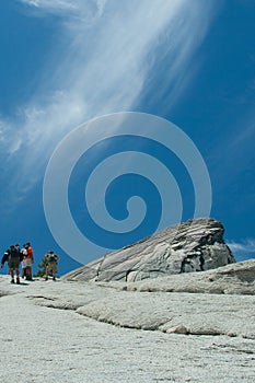 People walking up Half Dome