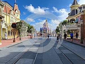 People walking up to Cinderella`s Castle in the Magic Kingdom at  Walt Disney World Resorts in Orlando, FL