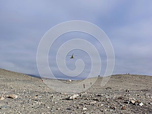 People wandering along Taylor Dry Valley in Antarctica