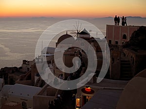 People watching the famous Oia Sunset at Oia village, Santorini Island