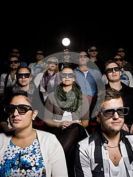People wearing 3d glasses at cinema