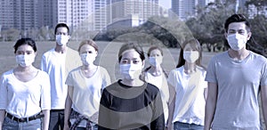 People wearing  protection mask to prevent germ, virus and PM 2.5 micron in city