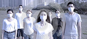 People wearing  protection mask to prevent germ, virus and PM 2.5 micron in city photo