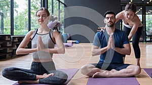 People who love health, exercise with yoga in the gym