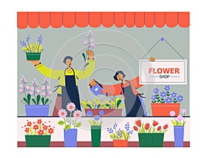 People work at florist shop or store. Woman and man sells flowers. Flower shop with flowers and plants in pots.