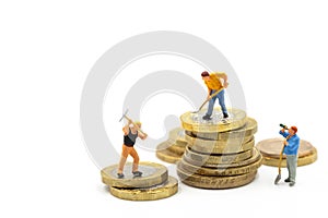 People worker working on coin money isolated on white. Employee Work for Make your Money Good retirement and Financial Freedom