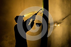 People working apping Rubber Tree at Night