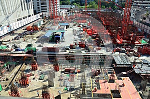 People working on Building Business Construction Site