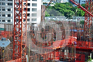 People working on Building Business Construction Site