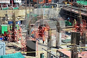 People working on Building Business Construction Site
