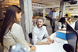 People working at busy modern office