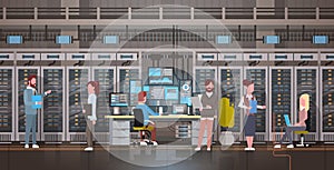 People Working In Data Center Room Hosting Server Computer Monitoring Information Database