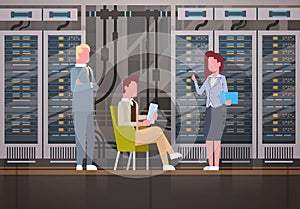 People Working In Data Center Room Hosting Server Computer Monitoring Information Database