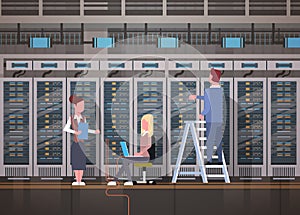 People Working In Data Center Room Hosting Server Computer Monitoring Information Database