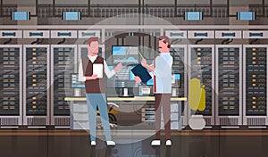 People Working In Data Center Room Hosting Server Computer Monitoring Information Database