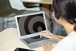 people working on laptop with blank copy space screen for advertising text image overlay in office desk, Back view of business