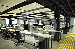People working at laptops at the large computer room, hackathon