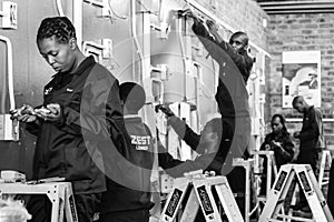 People, working on a machine at Vocational Skills Training Centre in Johannesburg in South Africa
