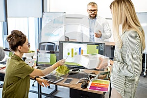 People working on the packaging design of a new eco product