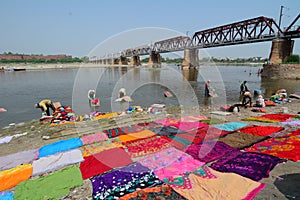 People working on the river bank in Agra, India