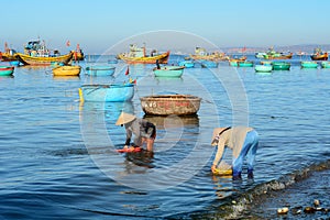 People working at seashore in Nhatrang
