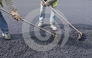 Peoples labor for paving