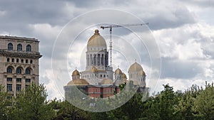 Peoples Salvation Cathedral under construction next to Palace of Parliament building in Bucharest, capital of Romania.