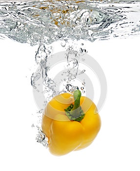 Pepper dropped in water