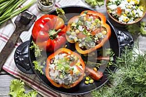 pepper stuffed with vegetables and greens and corn