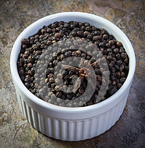 Peppercorns in a ramekin