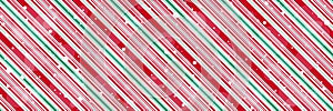 Peppermint candy cane diagonal stripes Christmas background with shiny snowflakes print seamless pattern