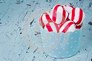 Peppermint candy on rustic setting