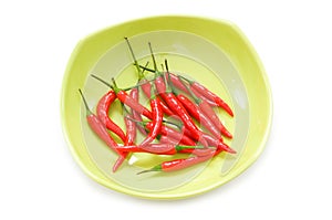 Peppers in plate isolated