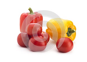 Peppers and tomatoes on a white background