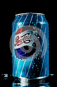 Pepsi jar beautifully stands on a black background