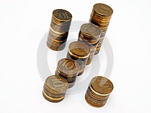 Percentage sign lined with stacks of Russian 10 ruble coins on a white background. Not isolated. Banks, microfinance organizations