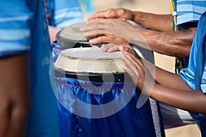 Percussionist hands playing atabaque. musical rhythm. African music