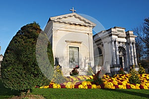 Pere Lachaise cemetery Chapel Flowers sunlight Paris