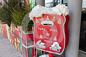 Pere noel pole nord french text means santa claus north pole on Mailbox for christmas letters to SantaClaus mail box red