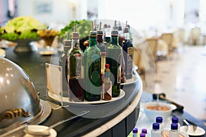 The perfect accompaniment. A collection of oilive oil and balsamic vinegar on the counter in a restuarant. photo